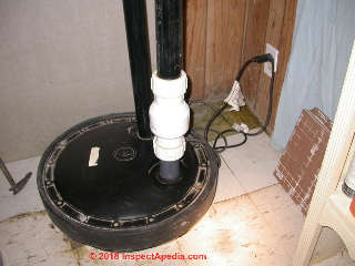 Sewage ejector pump (C) Daniel Friedman at InspectApedia.com