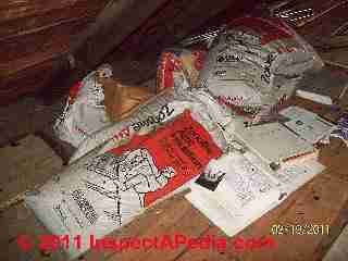 Vermiculite insulatin bags in an attic (C) D Friedman D Grudzinski
