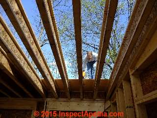 Nailing roof sheathing to the I-joist roof structure © Daniel Friedman at InspectApedia.com