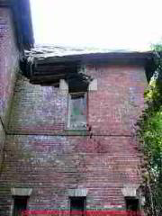 Photograph of a collapsing brick structure, a historic stable in Saugerties NY