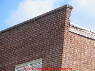 Brick parpet wall cracked and leaning: collapse risk and dangerous (C) Daniel Friedman at InspectApedia.com