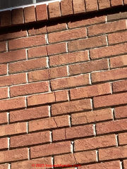 cracks in brick wall (C) InspectApedia.com SMonks