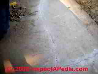 Cracks in a garage floor slab (C) D Friedman B Maltempo