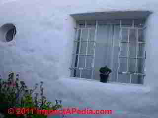 Straw bale wall cut for window © Daniel Friedman at InspectApedia.com