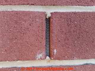 Brick weep opening screens at the Van Scriver Elementary School, Haddonfield New Jersey © Daniel Friedman at InspectApedia.com