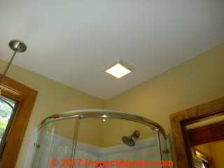 Exhaust fan in cathedral ceiling roof over a shower, finished installation (C) Daniel Friedman