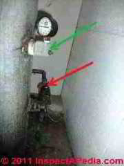Air inlet and air purge snifter valve photos © D Friedman at InspectApedia.com 