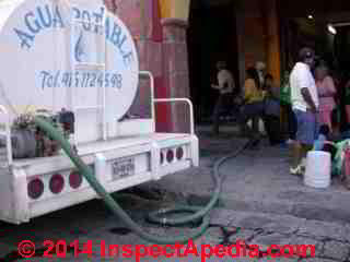 Water delivery to a restaurant cistern in San Miguel de Allende, Guanajuato, Mexico (C) Daniel Friedman
